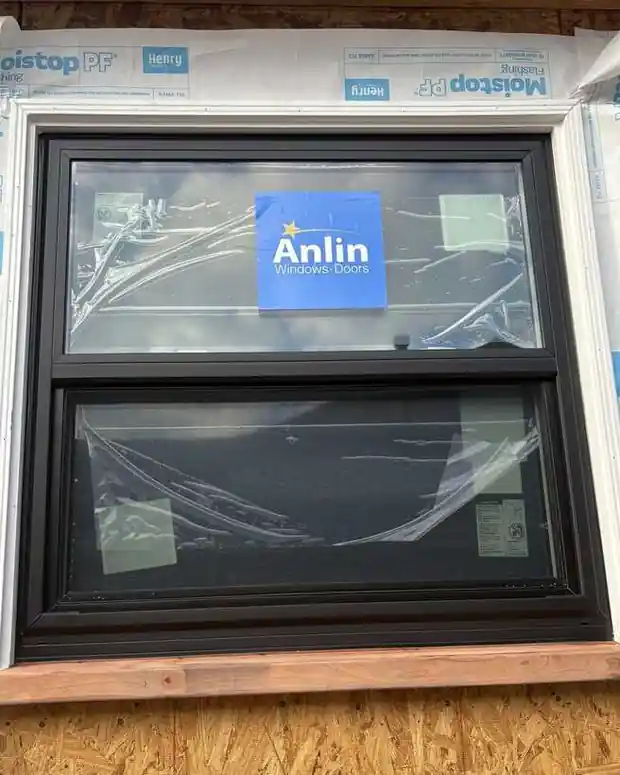 Black new-construction window installation