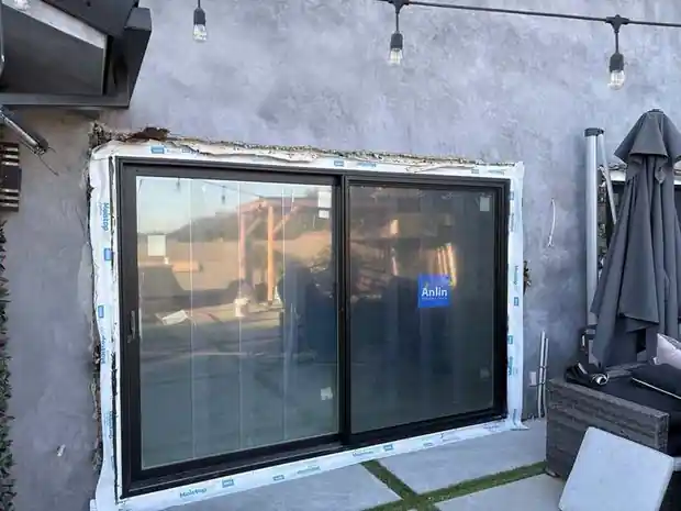 Black sliding patio door installation