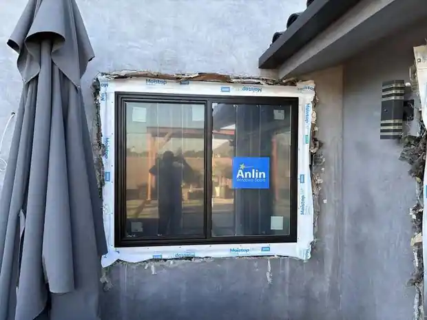 Black sliding window installation