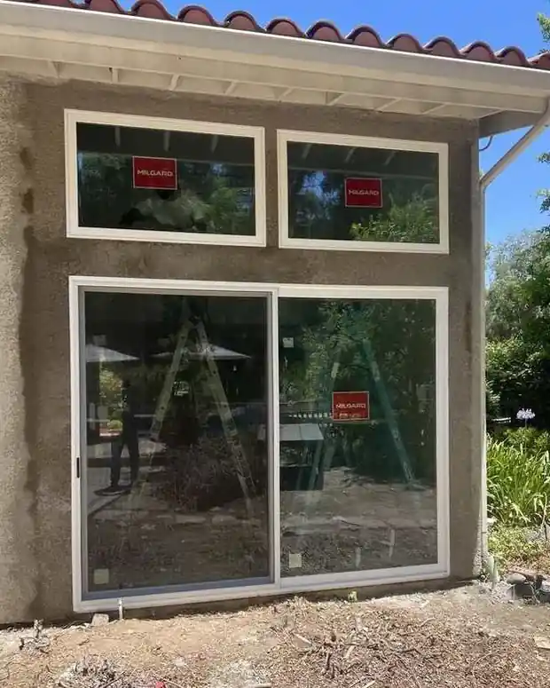 Window and sliding door combination installation